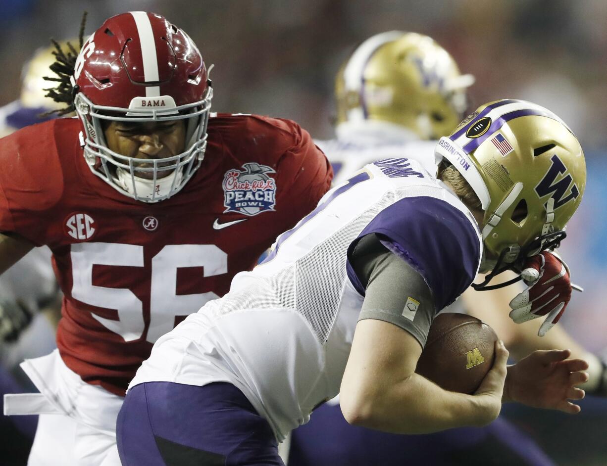 Alabama linebacker Tim Williams (56) sacks Washington quarterback Jake Browning (3) during the second half of the Peach Bowl NCAA college football playoff game, Saturday, Dec. 31, 2016, in Atlanta.