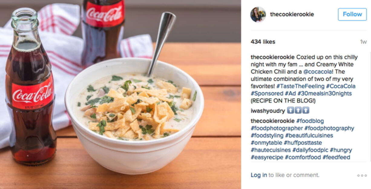 A social media post featuring a bottle of Coca-Cola next to a bowl of chicken chili.