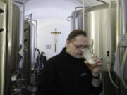 Master brewer Jiri Kratochvil tastes a beer at a brewery located inside a 12th century complex of the Zeliv monastery in Zeliv, Czech Republic.