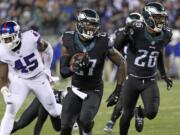 Philadelphia Eagles' Malcolm Jenkins (27) runs for a touchdown after intercepting a pass during the first half of an NFL football game against the New York Giants, Thursday, Dec. 22, 2016, in Philadelphia.