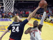 Arizona guard Rawle Alkins, right, shoots as Gonzaga center Przemek Karnowski defends during the second half. (Mark J.