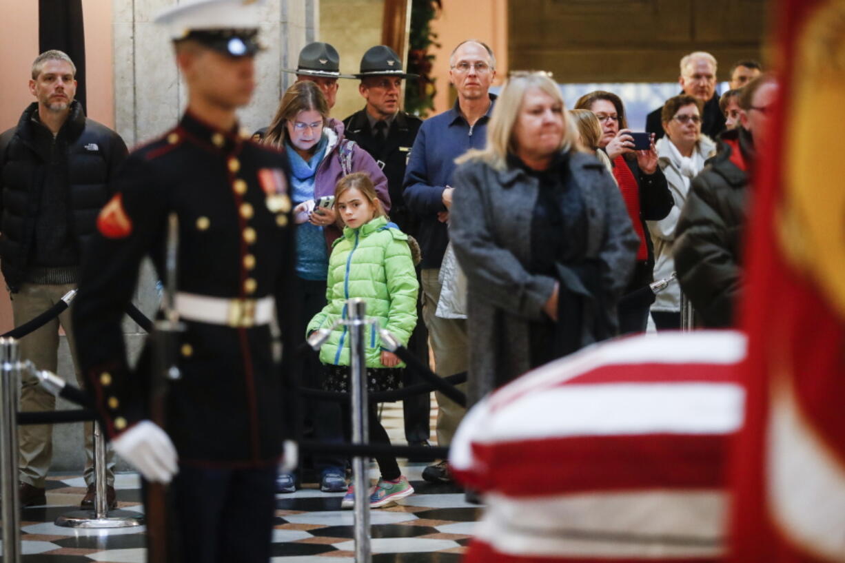 Mourners arrive to view the casket of John Glenn on Friday in Columbus, Ohio.  Glenn&#039;s home state and the nation began saying goodbye to the famed astronaut who died last week at the age of 95.