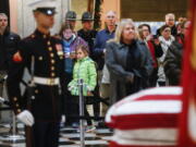 Mourners arrive to view the casket of John Glenn on Friday in Columbus, Ohio.  Glenn&#039;s home state and the nation began saying goodbye to the famed astronaut who died last week at the age of 95.