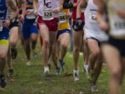 The men battle the weather as well as each other as they run the NAIA cross country national championship race at Fort Vancouver on Nov. 17, 2012. The NAIA announced on Monday, Dec. 12, 2016, that the 2017 and 2019 championships will return to Vancouver.