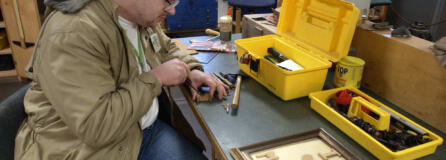 Raymond Marshall works in a wood shop at the Special Commitment Center for sex offenders Feb. 5, 2003, at McNeil Island.