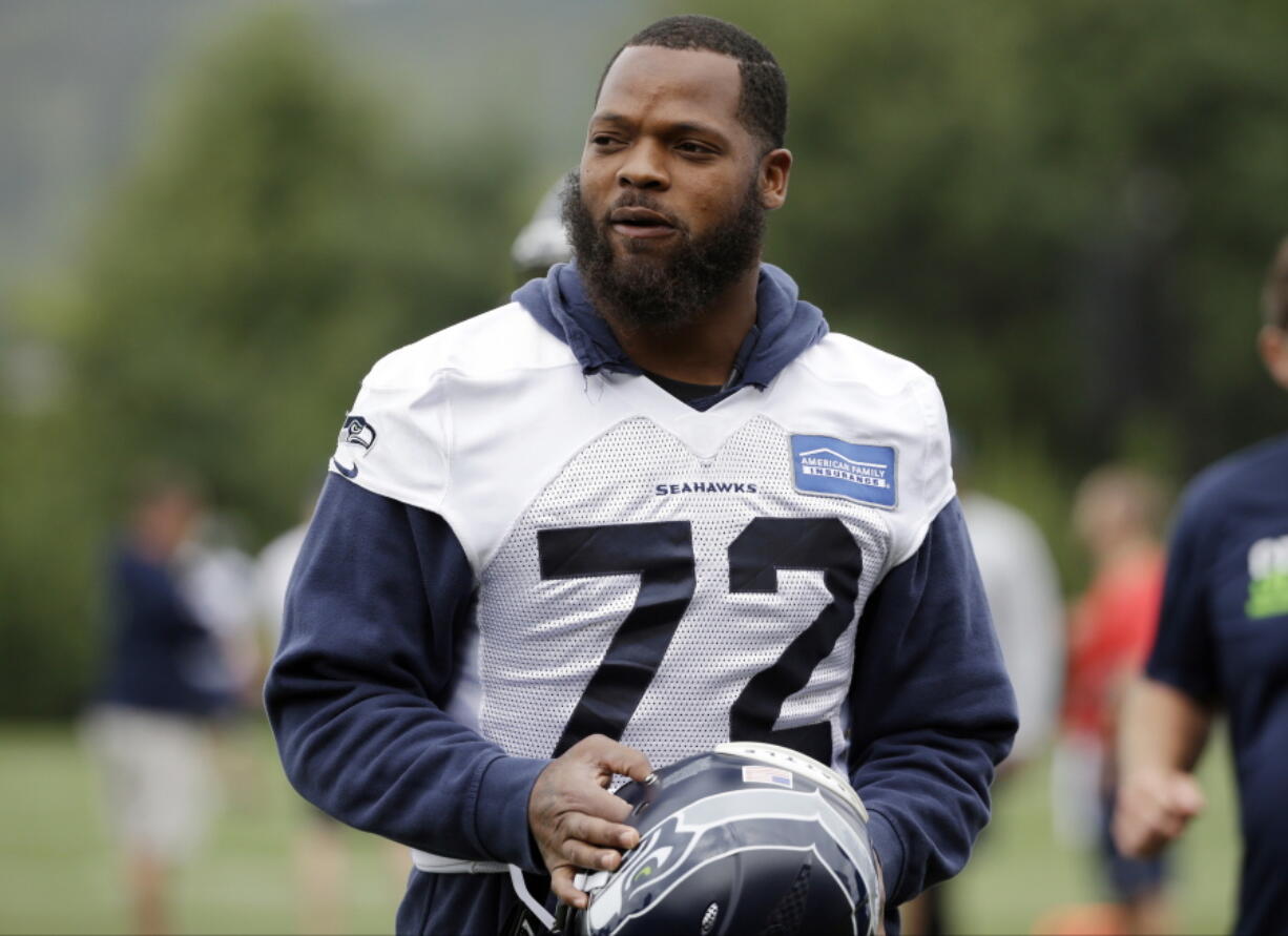 Seattle Seahawks&#039; Michael Bennett reached agreement on a three-year contract extension with the team on Friday, Dec. 30, 2016, that will keep the defensive end under contract through the 2020 season.