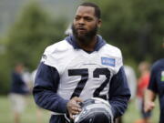 Seattle Seahawks&#039; Michael Bennett reached agreement on a three-year contract extension with the team on Friday, Dec. 30, 2016, that will keep the defensive end under contract through the 2020 season.