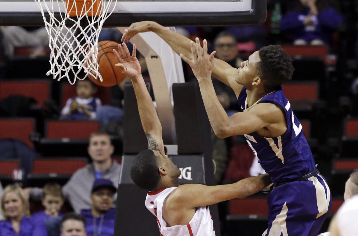 Washington's Markelle Fultz, right, blocks a shot by Seattle's Brendan Westendorf during the second half of an NCAA college basketball game Thursday, Dec. 22, 2016, in Seattle. Washington won 94-72.