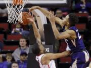 Washington's Markelle Fultz, right, blocks a shot by Seattle's Brendan Westendorf during the second half of an NCAA college basketball game Thursday, Dec. 22, 2016, in Seattle. Washington won 94-72.