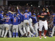 Chicago Cubs celebrate after Game 7 of the Major League Baseball World Series against the Cleveland Indians in Cleveland. The Cubs won 8-7 in 10 innings to win the series 4-3. The memorable World Series was one of the big stories in Ohio for 2016.