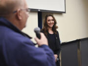 Jaime Herrera Beutler listens Tuesday to a question from David Letinich during an open town hall forum at 40 Et 8 Chateau in Vancouver on Jan. 17.