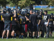 Hudson&#039;s Bay head coach Mark Oliverio works with the team during practice Thursday afternoon, Sept. 10, 2015.