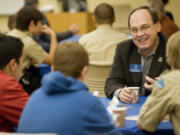 Vancouver City Council member Jack Burkman speaks with Boy Scouts at a 2012 town hall meeting.