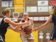 Prairie&#039;s Jozie Tangeman (center) blasts through Skyview&#039;s defenses in a game last month. Prairie is ranked fourth in the state by the Associated Press, but is 17th in RPI.