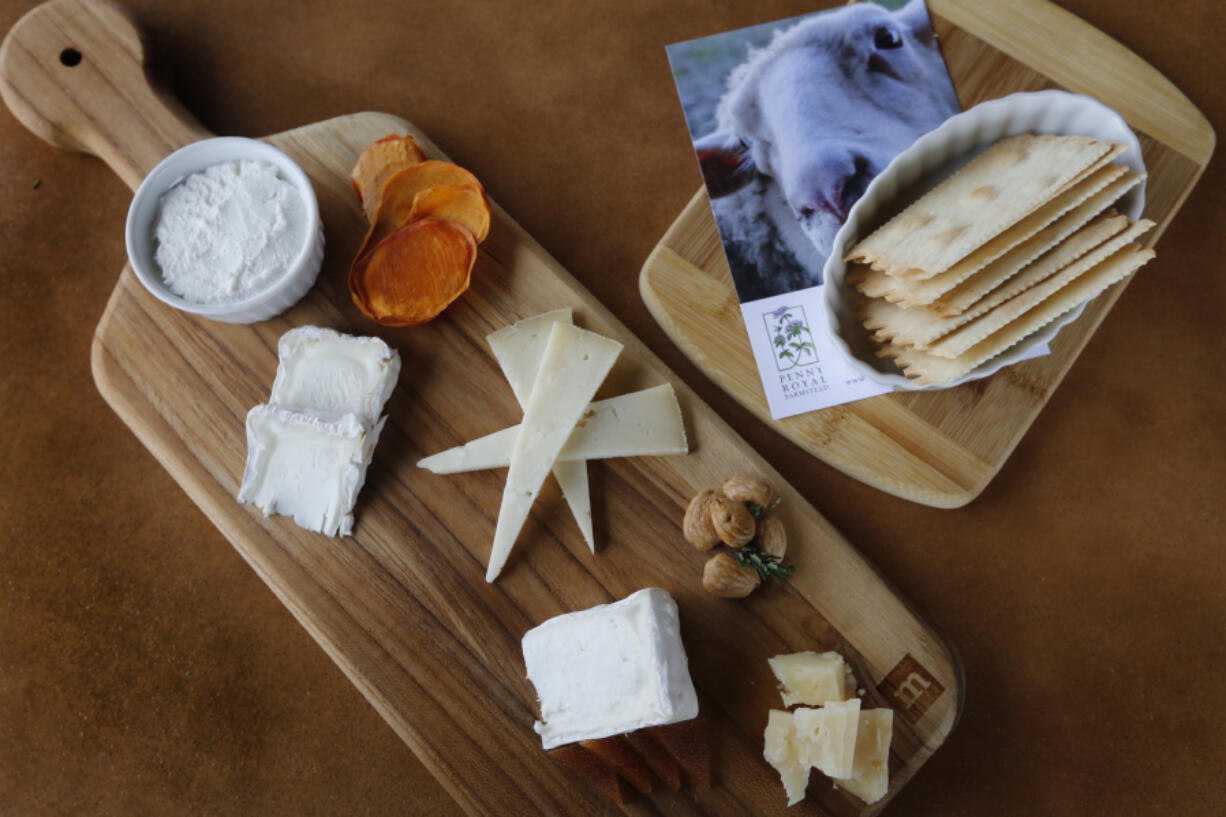 Guests can get a tasting sample of the many specialty cheeses as they also taste the many wines at the Penny Royal Farmstead in Boonville, Calif. (Laura A.