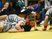 Battle Ground&#039;s Brett Joner pins Union&#039;s Brandon Esperto to win the 106-pound weight class Saturday at the Clark County Championships.