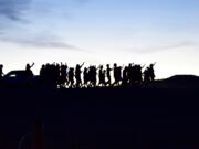 Youth march and chant &quot;water is life&quot; from the Cannonball to the Oceti Sakowin camp in North Dakota in October. Jacqueline Keeler, a Portland journalist who traveled to North Dakota to attend Dakota Access Pipeline protests, will be teaching a class on the protests at Clark College beginning next week.