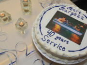 A salute in frosting for Bert Burgess and his boat Breezy II during Sunday&#039;s retirement party.