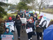 About 150 protesters march along the Vancouver waterfront during the Women&#039;s March on Saturday. The marchers, in solidarity with the Women&#039;s March on Washington, protested President Donald Trump&#039;s policies.