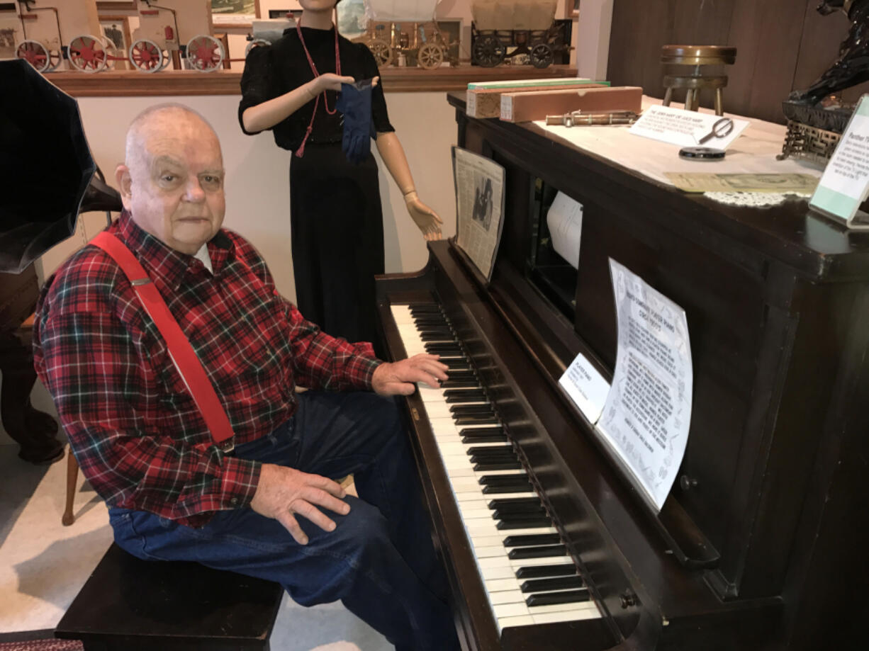 Washougal: Camas-Washougal Historical Society President Jim Cobb sits at one of the instruments the society is hoping to refurbish for display at Two Rivers Heritage Museum.