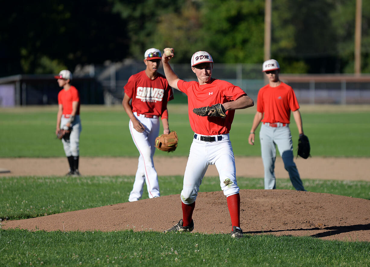 Jasper Rank of Hazel Dell Metro, center, works on his skills during practice at Columbia River High School on Wednesday afternoon, August 5, 2015.