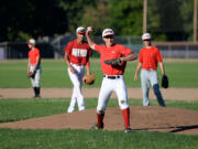 Jasper Rank of Hazel Dell Metro, center, works on his skills during practice at Columbia River High School on Wednesday afternoon, August 5, 2015.