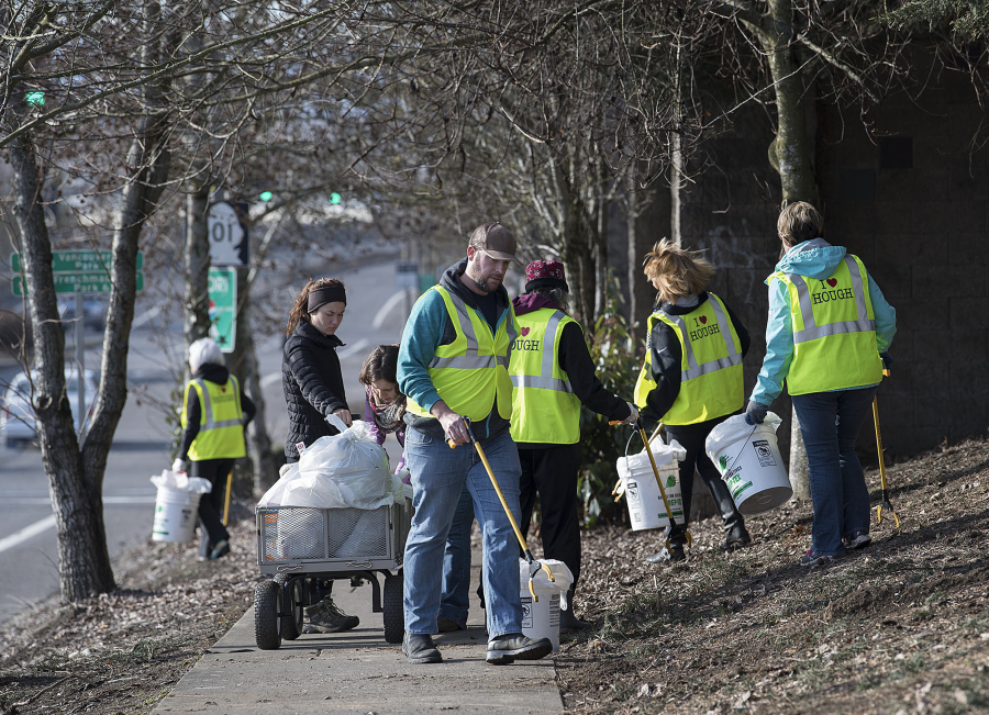 Hough volunteers on garbage patrol clean up neighborhood - The