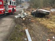 A Cadillac slammed into the corner of a guardrail Wednesday before noon near Exit 11 on Interstate 5 in Clark County.