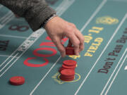 Participants learn more about the casino game &quot;Craps&quot; at Ilani Casino Resort on Friday morning, Jan. 13, 2017.