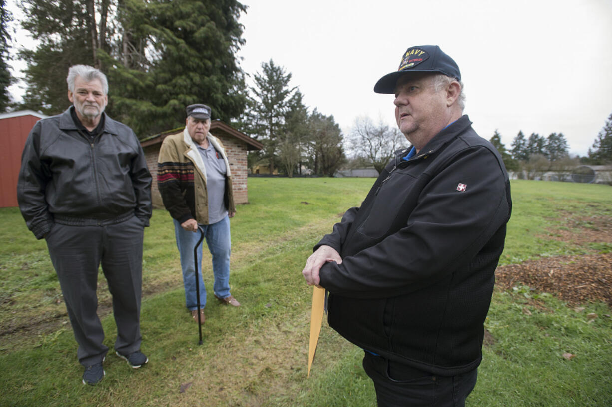 Veterans Ron Powers, from left, Ron Fryer and Michael Stacey talk about their idea for a microhome village for veterans in the West Minnehaha neighborhood in Vancouver.