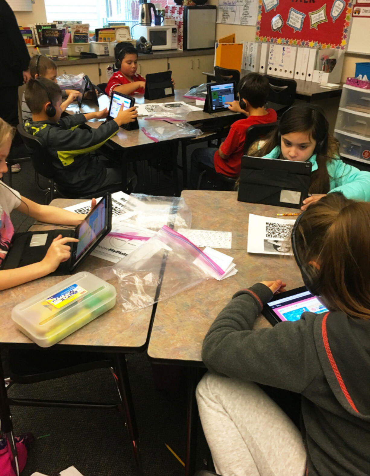 Five Corners: Orchards Elementary School students participate in an Hour of Code, intended to help with creativity and critical thinking.