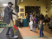 Portland-based cat rapper Moshow raps about his cats and about adopting pets Monday night for a crowd gathered at the Humane Society for Southwest Washington.