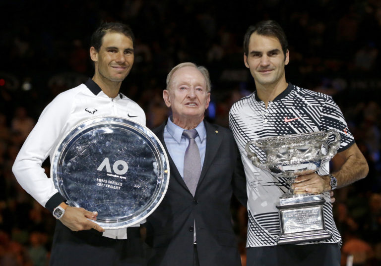 Switzerland's Roger Federer, right, Spain's Rafael Nadal, left, and Rod Laver pose for photographers after Federer won the men's singles final at the Australian Open tennis championships in Melbourne, Australia, Sunday, Jan. 29, 2017.