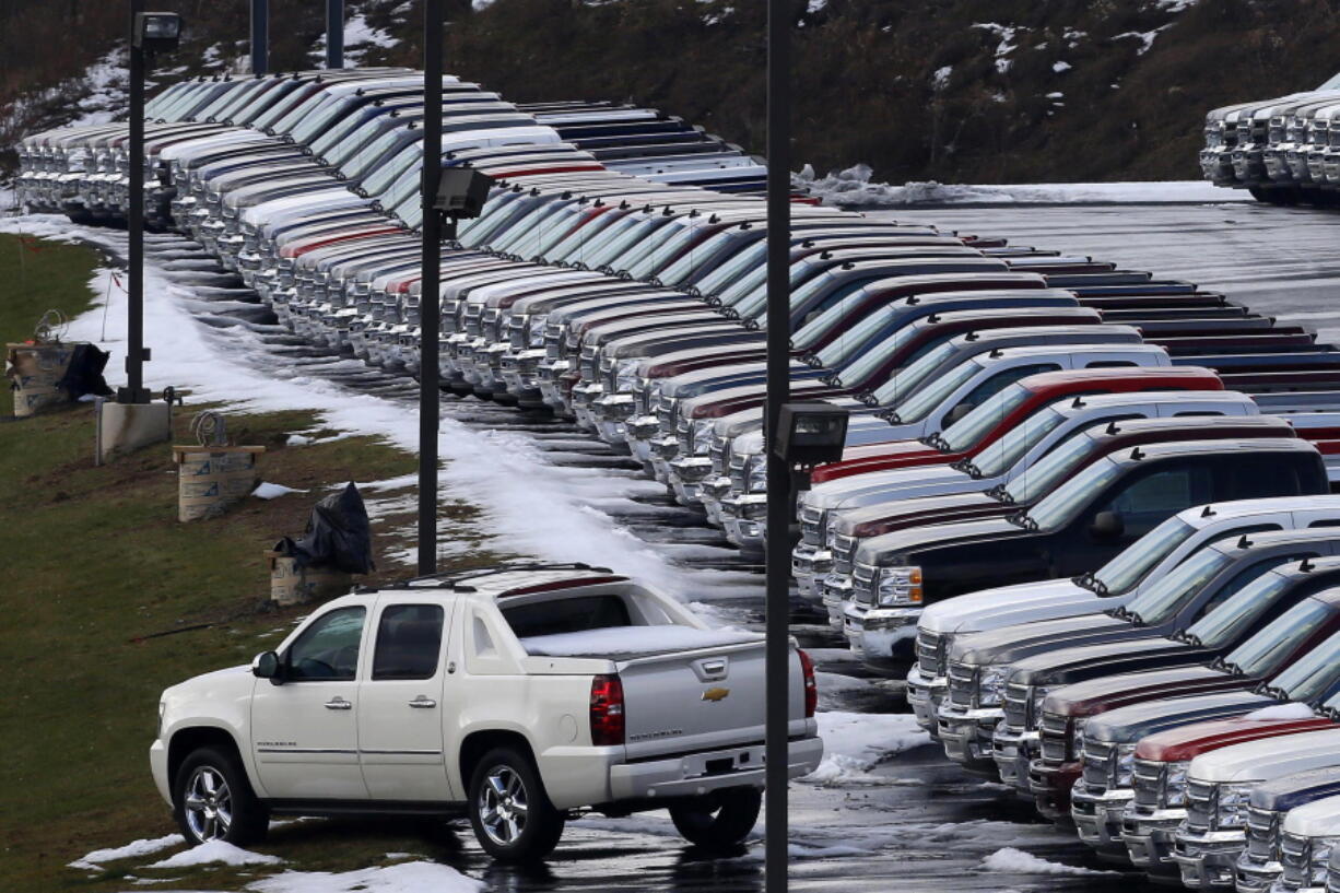 Chevy trucks line the lot of a dealer in Murrysville, Pa.