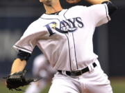 Starting pitcher Drew Smyly was acquired by the Mariners, along with right-hander reliever Shae Simmons.