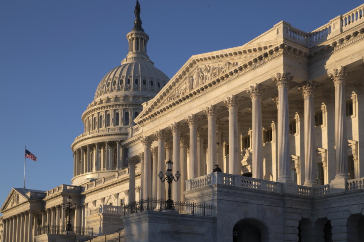 The Capitol in Washington is seen early Wednesday as members of Congress break for political retreats with the Democrats heading to Baltimore and Republicans to Philadelphia. (AP Photo/J.