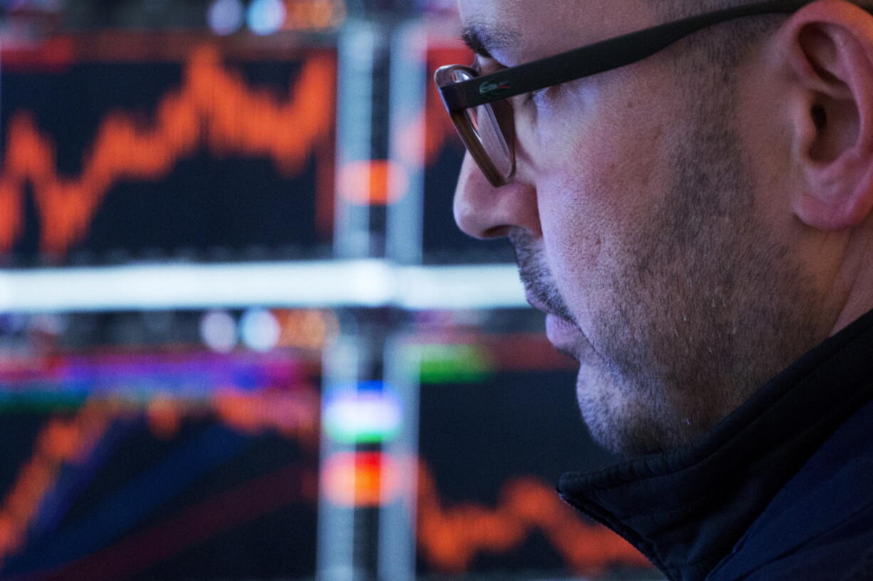 A trader works at the New York Stock Exchange on Monday.