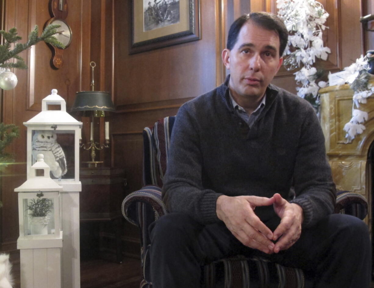 Wisconsin Gov. Scott Walker speaks during an interview with The Associated Press in Maple Bluff, Wis. Republican governors who turned down billions in federal dollars from an expansion of Medicaid under President Barack Obama???s health care law now have their hands out in hopes the GOP Congress comes up with a new formula to provide insurance for low-income Americans.