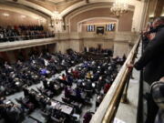 Gov. Jay Inslee is applauded during his inaugural address to a joint session of the Legislature Wednesday, Jan. 11, in Olympia.