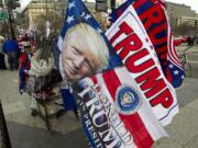 Flags with the image of President-elect Donald Trump are displayed for sale in Pennsylvania Avenue in Washington on Thursday ahead of Friday's inauguration.