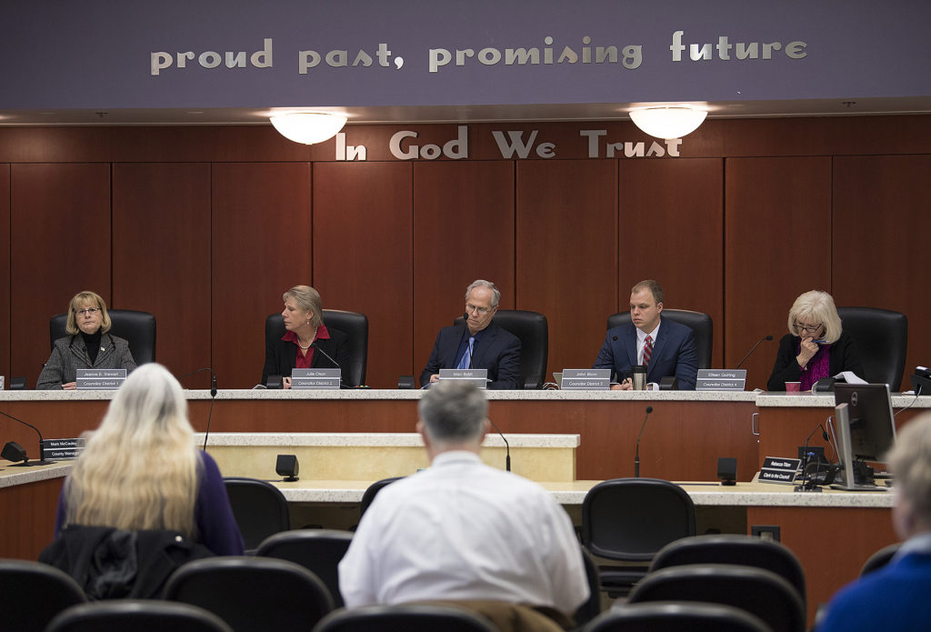 Clark County council members Jeanne Stewart, from left, Julie Olson, Marc Boldt, John Blom and Eileen Quiring discuss issues during a meeting in council chambers on Tuesday morning.