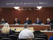 Clark County council members Jeanne Stewart, from left, Julie Olson, Marc Boldt, John Blom and Eileen Quiring discuss issues during a meeting in council chambers on Tuesday morning.