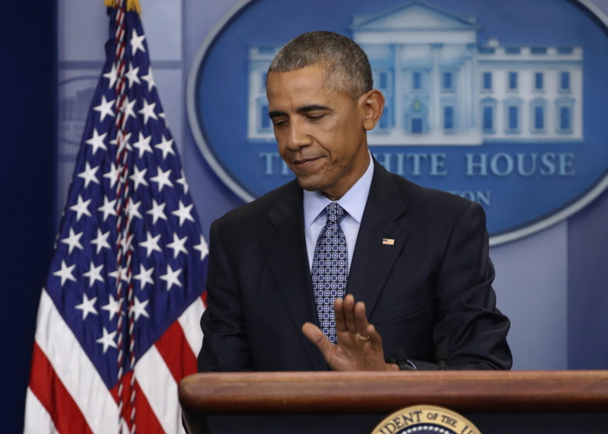 President Barack Obama taps the podium as he concludes his final presidential news conference in the briefing room of the White House in Washington. Eight tumultuous years at the helm of American power have come and gone, and for Obama, this is finally the end. The president is spending his last full day at the White House on Thursday before becoming an ex-president.