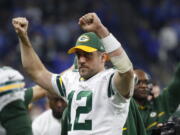 Green Bay Packers quarterback Aaron Rodgers reacts on the bench after an NFL football game against the Detroit Lions, Sunday, Jan. 1, 2017, in Detroit. The Packers defeated the Lions 31-24.