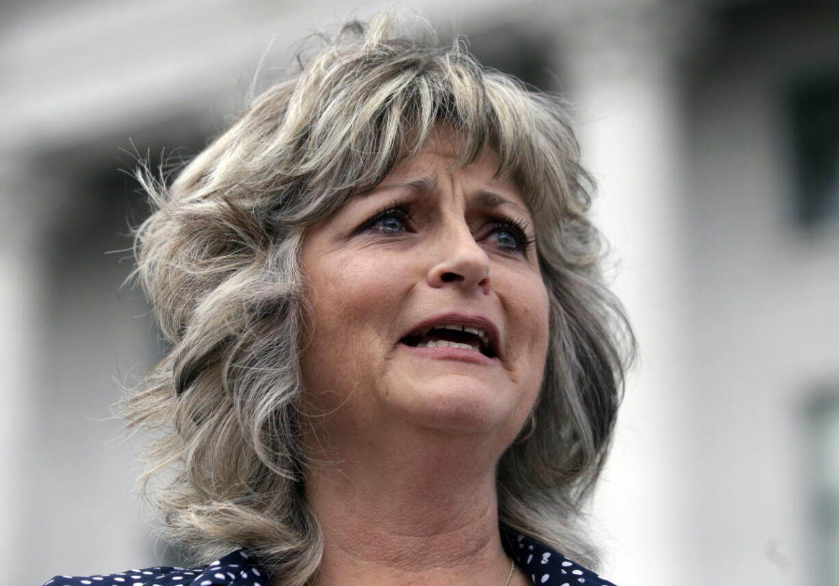 FILE - This Saturday, March 5, 2016, file photo, Jeanette Finicum speaks with reporters during a rally at the Utah State Capitol, in Salt Lake City. Finicum, the widow of an Arizona rancher LaVoy Finicum killed by FBI agents in a Jan. 26, 2016, traffic stop in central Oregon, is planning to hold a meeting in John Day, Ore., Jan. 28, 2017, with their children, in an effort to continue with his mission.