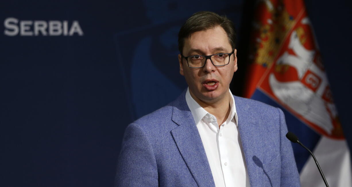 Serbian Prime Minister Aleksandar Vucic speaks during a press conference in Belgrade, Serbia, Saturday, Jan. 14, 2017. A Serbian train, sent to Kosovo despite protests from the government in Pristina which called it a violation of its sovereignty, was stopped at the border on Saturday, triggering a dramatic escalation of tensions between the former wartime foes.