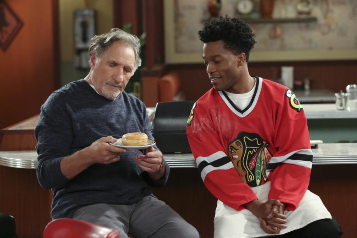 Judd Hirsch, left, and Jermaine Fowler in a scene from the new comedy sitcom series &quot;Superior Donuts&quot; on CBS.