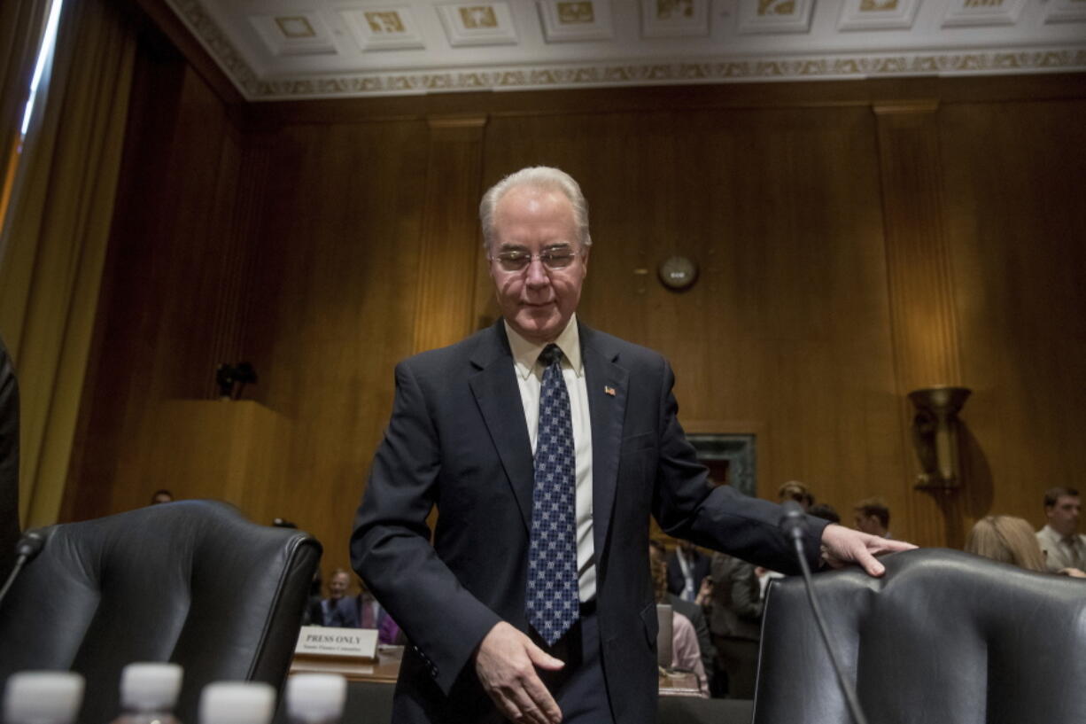 Health and Human Services Secretary-designate, Rep. Tom Price, R-Ga., arrives on Capitol Hill in Washington on Tuesday to testify at his confirmation hearing before the Senate Finance Committee.