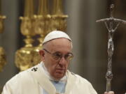 Pope Francis celebrates a new year&#039;s Mass in St. Peter&#039;s Basilica at the Vatican on Sunday.