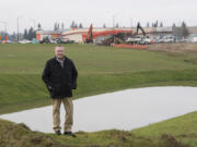 Bill Iyall, chairman of the Cowlitz Tribe, is pictured near the new Ilani Casino Resort near La Center.